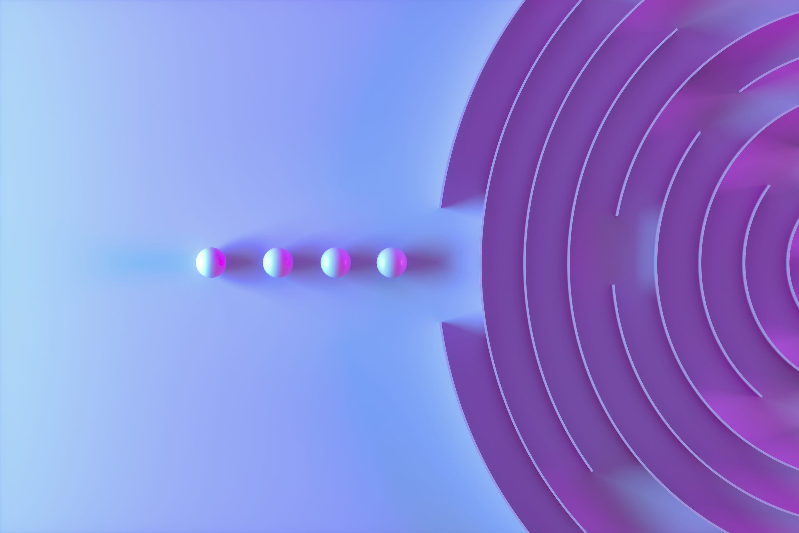 Four small balls entering a circular maze